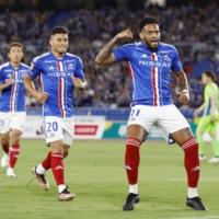 Marinos\' Anderson Lopes celebrates after scoring his second goal in his team\'s win over Bellmare on Sunday. | KYODO