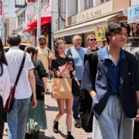 Shoppers in the Harajuku district of Tokyo on June 17 | BLOOMBERG