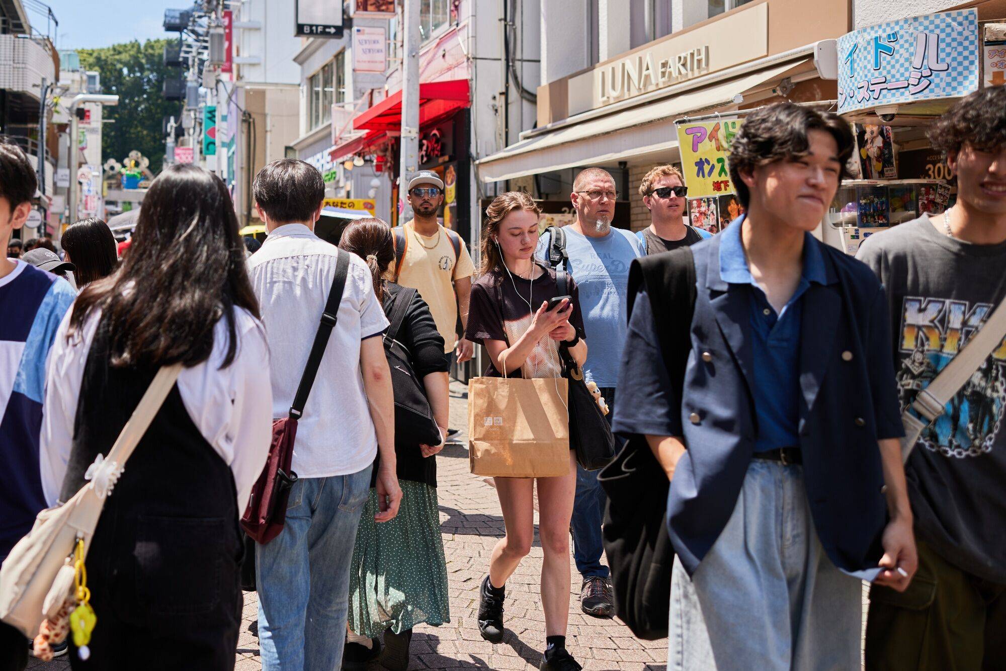 Shoppers in the Harajuku district of Tokyo on June 17 | BLOOMBERG