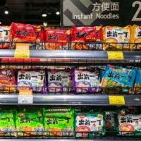 A top-performing equity fund in Japan is buying \"high quality” defensive stocks such as those of noodle-maker Nissin Foods. | BLOOMBERG