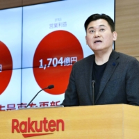 Rakuten CEO Hiroshi Mikitani speaks during a news conference in Tokyo in February 2019. The online retailer has seen its shares tumble to a 14-year low during the first half of 2023. | KYODO