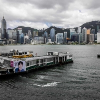 Hong Kong\'s Victoria Harbor on Tuesday. Stung by a lack of workers, the city has had problems even handling the small numbers of tourists coming in, with reports of mainland tour groups having to eat noodles while standing on the sidewalk.  | AFP-JIJI