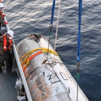 A handout picture shows part of what is believed to be a space launch vehicle that North Korea said crashed into the sea off the west coast of the divided peninsula, and which the South Korean military had salvaged, on June 15. | THE DEFENSE MINISTRY / HANDOUT VIA REUTERS  