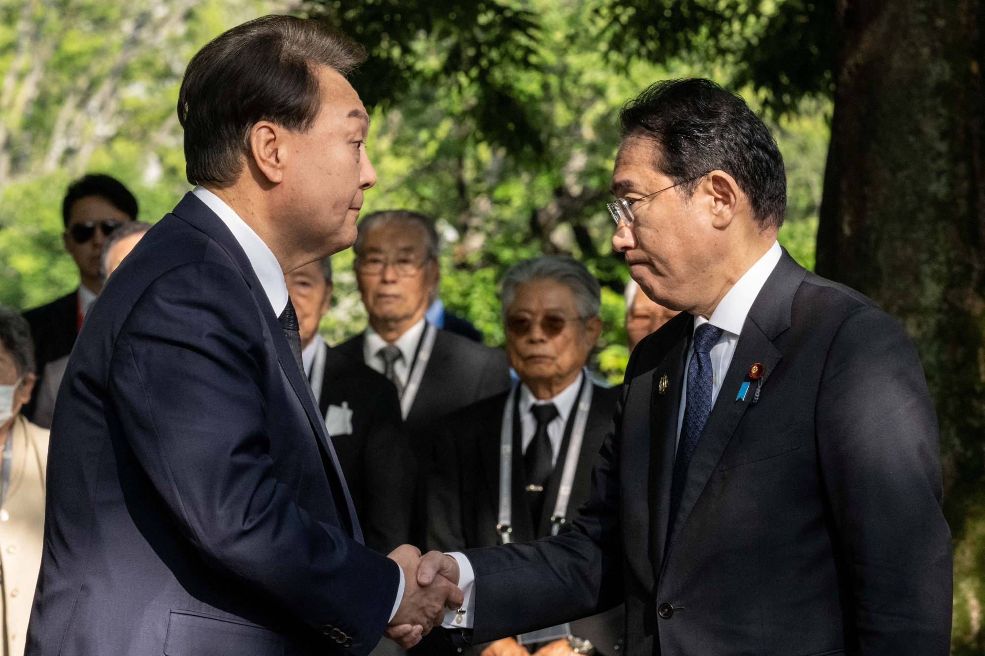 South Korean President Yoon Suk-yeol and Prime Minister Fumio Kishida met during the Group of Seven summit in Hiroshima in May. | POOL / VIA REUTERS