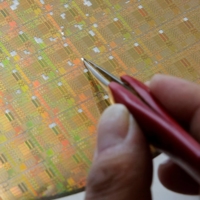 A semiconductor wafer at a research center in Beijing. China plans to limit the export of its gallium and germanium, metals used to make chips, electric cars and telecommunications equipment. | REUTERS