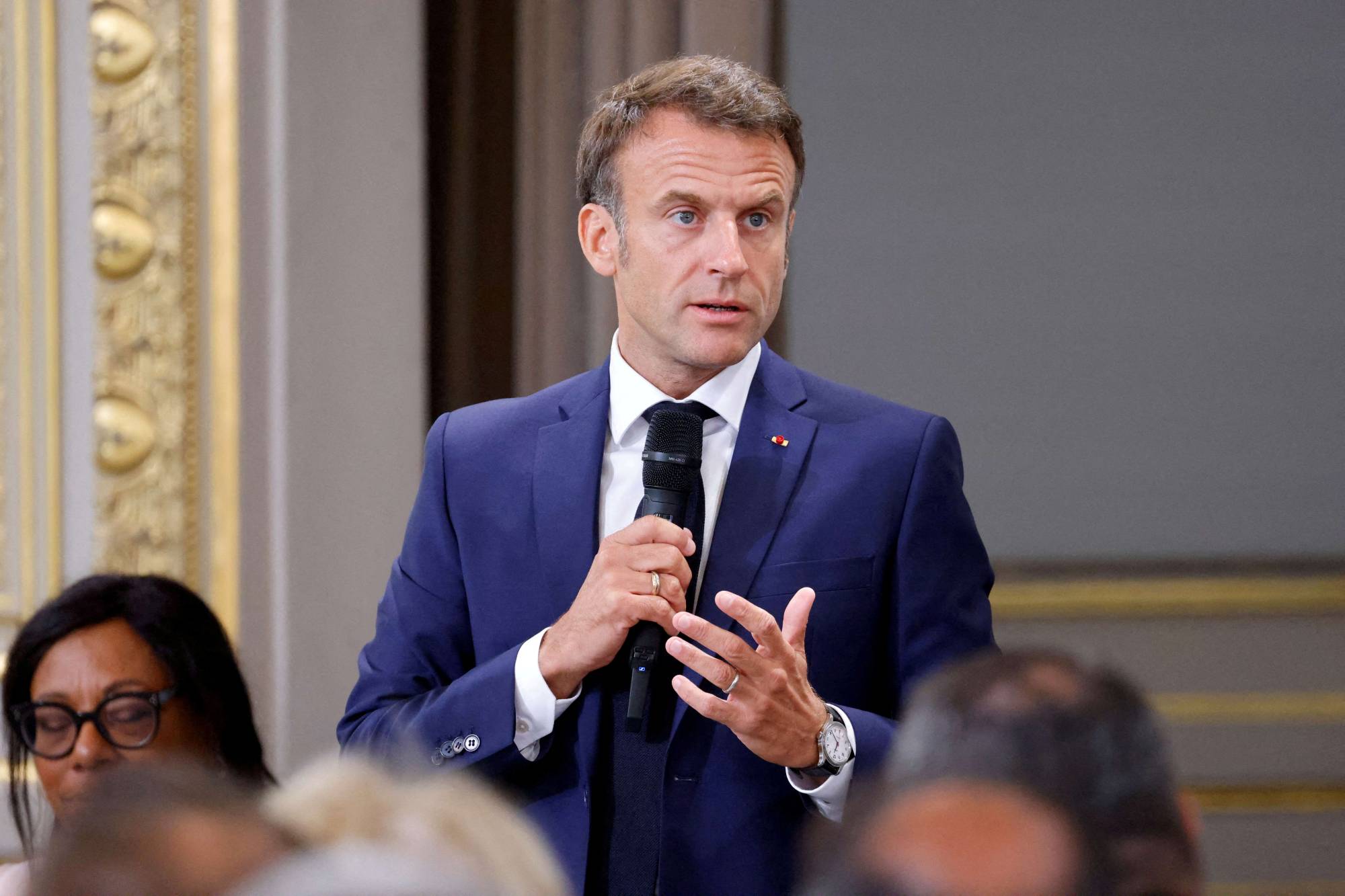 French President Emmanuel Macron says he is opposed to NATO's plan to open an office in Tokyo. | POOL / VIA REUTERS
