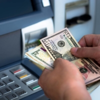 Criminal gangs began exploiting Revolut\'s payment systems early in 2022, encouraging individuals to make large transactions that would be declined, then withdraw the refunded sums via ATMs. | GETTY IMAGES