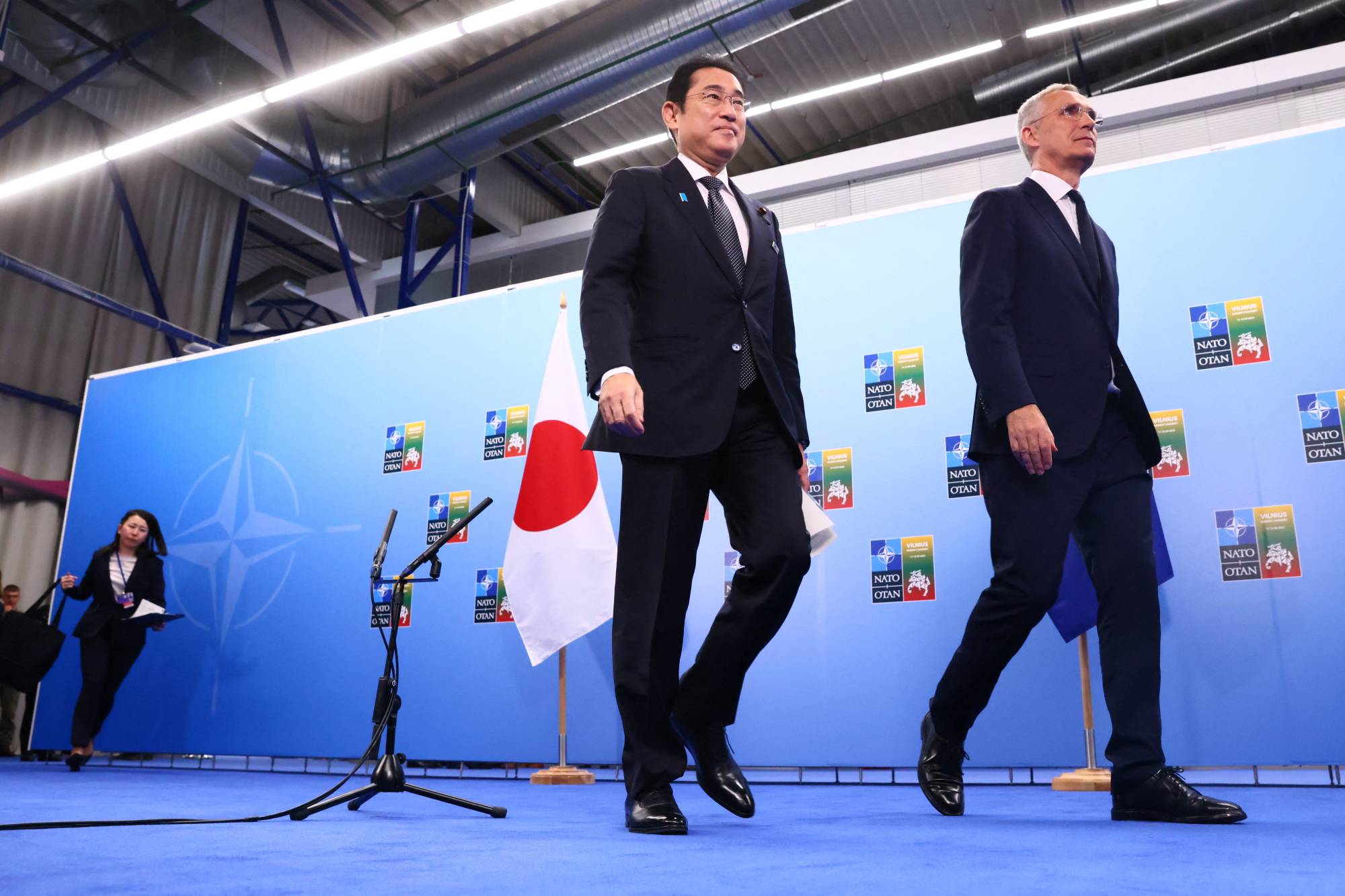 Prime Minister Fumio Kishida and NATO Secretary-General Jens Stoltenberg meet during a NATO leaders' summit in Vilnius, Lithuania, on Wednesday. | REUTERS