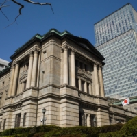At least some in the financial markets think the BOJ may choose to reshape its policy of holding down 10-year yields, to help boost an economy already showing signs of improved price and wage trends. | BLOOMBERG