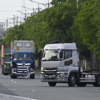 Japan\'s transport delivery capacity is expected to drop when new regulations starting in April limits truck drivers\' overtime to 960 hours a year. | KYODO