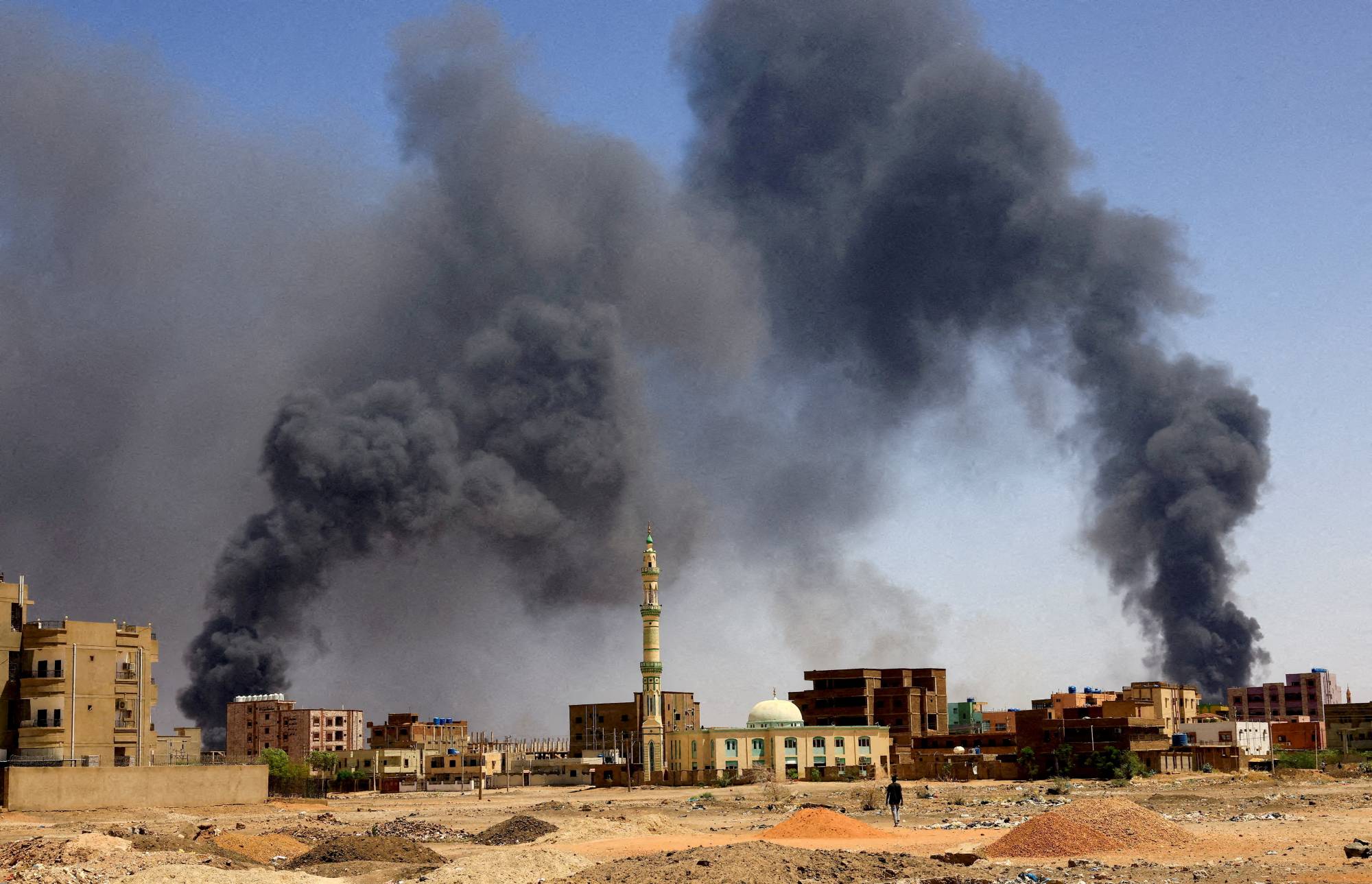 Smoke rises amid military clashes in Khartoum North, Sudan, on May 1. | REUTERS