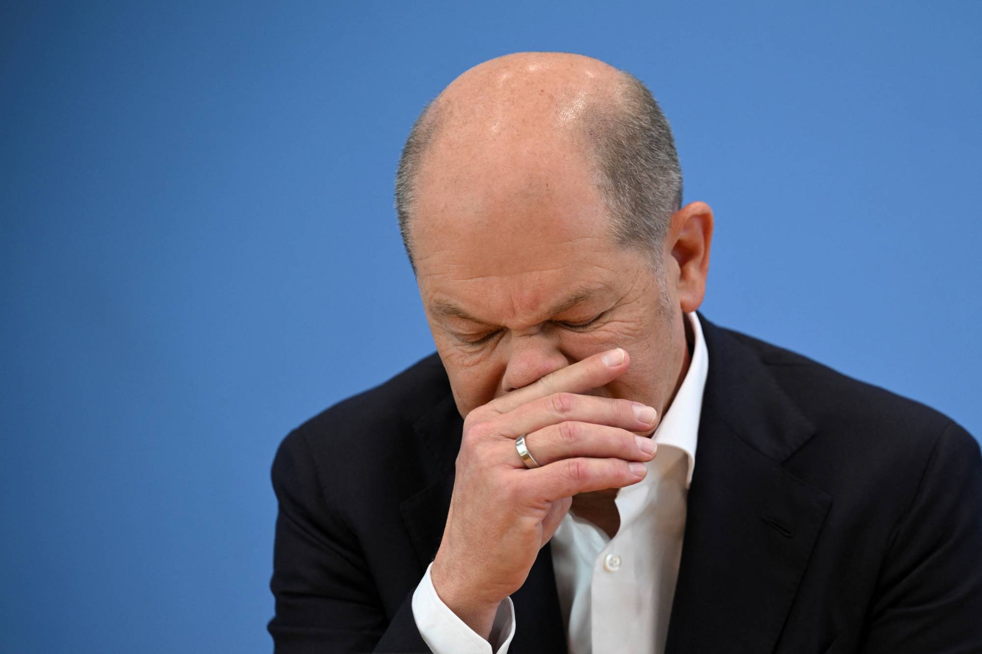 German Chancellor Olaf Scholz holds a news conference in Berlin on Friday. | Reuters 
