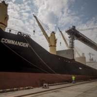 The first U.N.-chartered vessel MV Brave Commander carrying more than 23,000 tons of grain to be sent to Ethiopia is docked east of Odessa on the Black Sea coast in August 2022. | AFP-JIJI