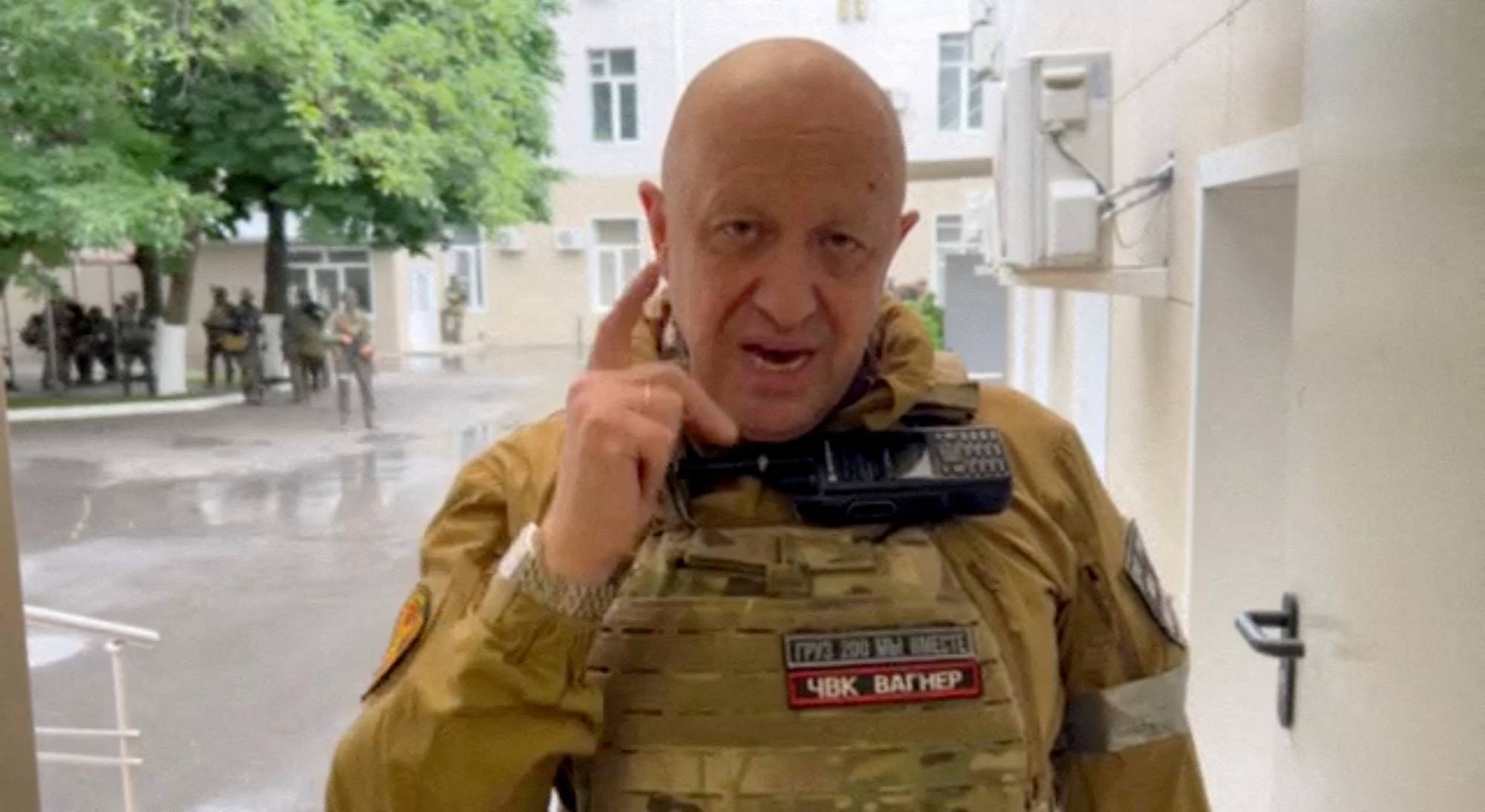 Wagner mercenary group leader Yevgeny Prigozhin speaks inside the headquarters of the Russian southern army military command center in this still image from a video released June 24. | Handout via REUTERS