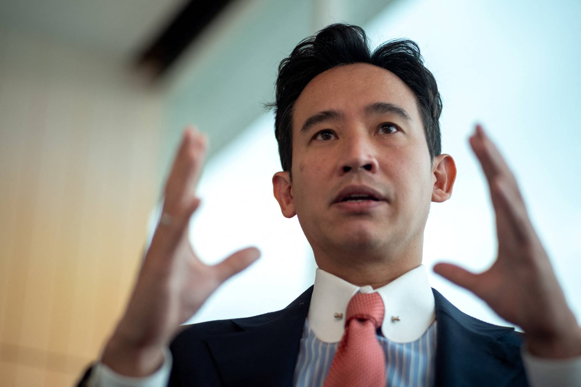 Move Forward Party Leader Pita Limjaroenrat speaks during an interview in Bangkok on Tuesday.  | REUTERS