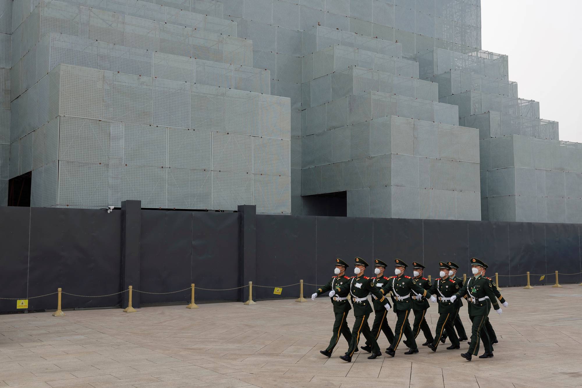 Paramilitary police officers in Tiananmen Square in Beijing in March.  | REUTERS