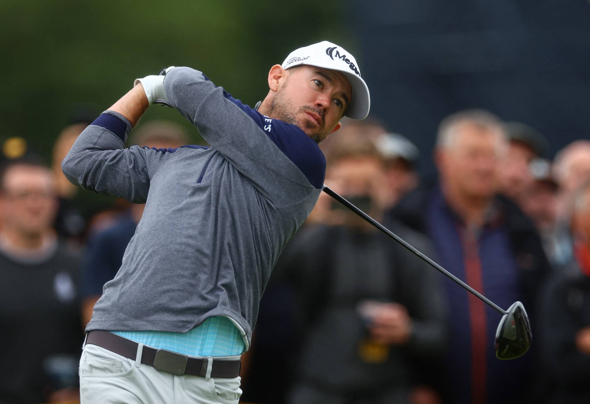 Brian Harman tees off on the 16th hole during the third round of the British Open in Hoylake, England, on Saturday. | REUTERS