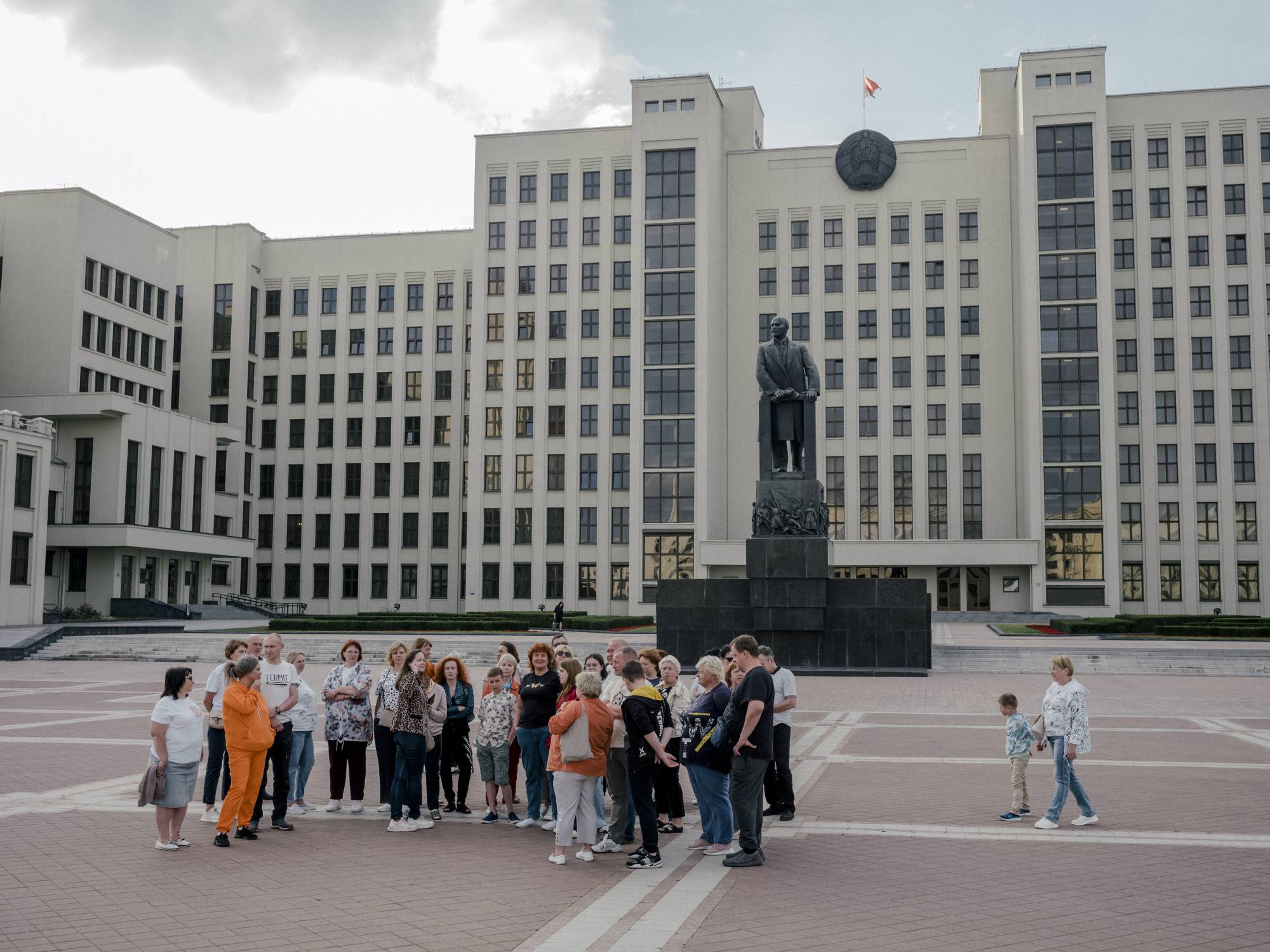 A tour group near the Lenin Monument in Minsk, Belarus, earlier this month. | Nanna Heitmann / The New York Times