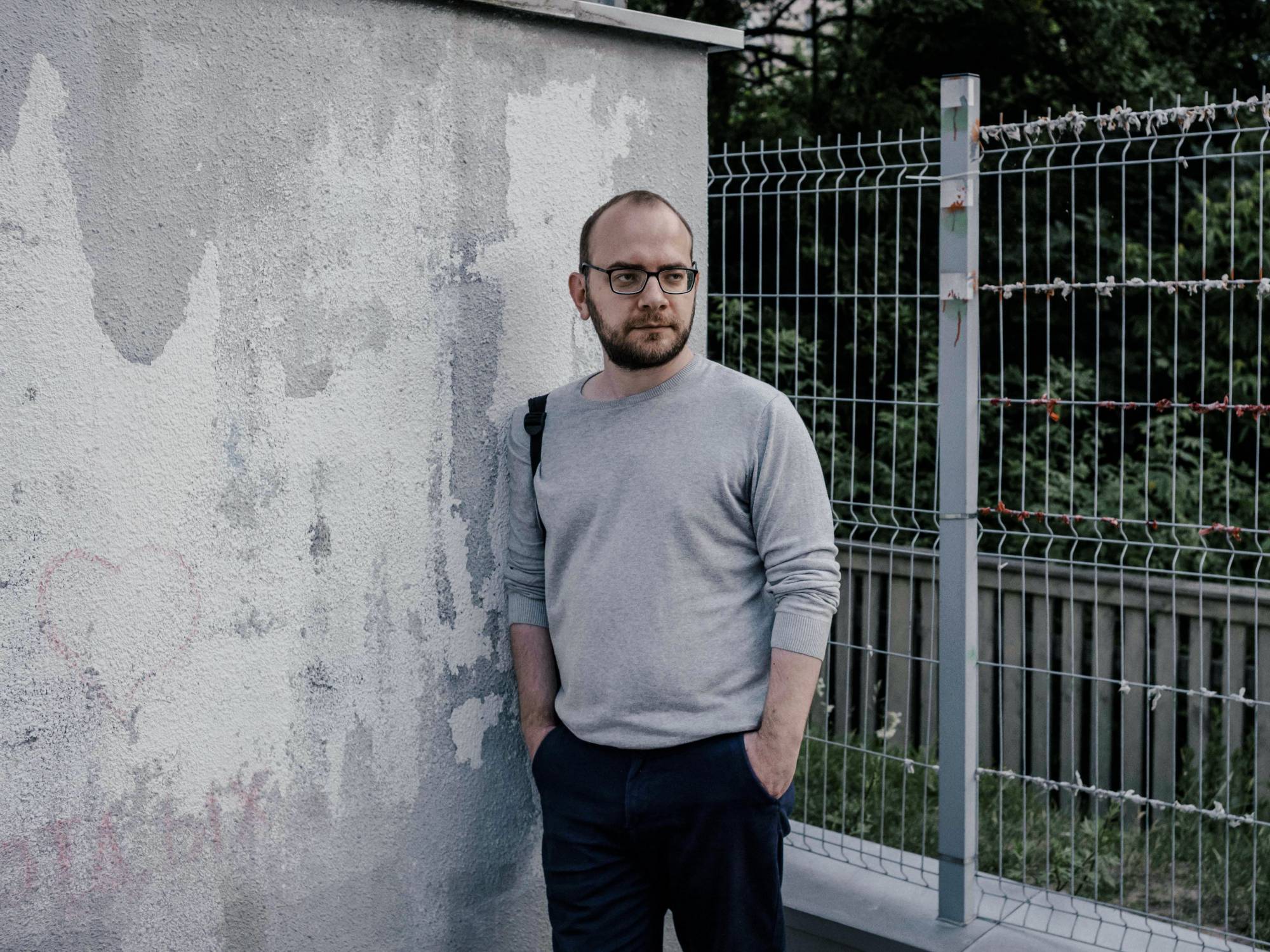 Igor Ilyash stands where his wife was arrested for reporting about the protests that took place there in 2020, at Peremen Square in Minsk, Belarus, earlier this month. | Nanna Heitmann / The New York Times