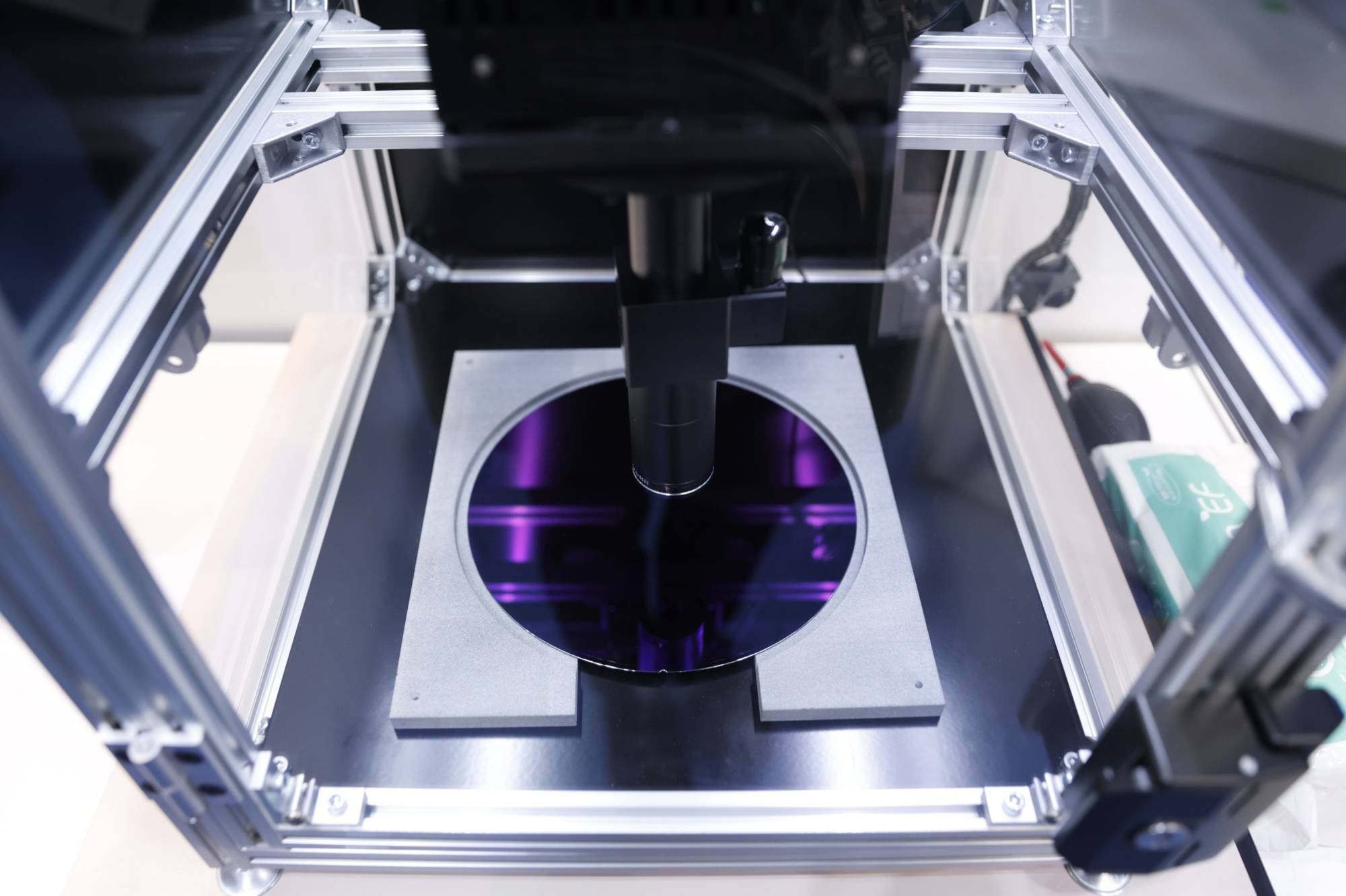 A demonstration of wafer inspection using Sony Semiconductor Solutions' image sensor at the Semicon Japan exhibition in Tokyo in December. Japan's restrictions on exports of advanced chip-manufacturing equipment including those for cleaning, checkups and lithography, took effect Sunday. | BLOOMBERG