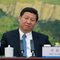 Common touch: China\'s new leader, Xi Jinping, attends a meeting with \"foreign experts\" in Beijing on Wednesday. | AFP-JIJI