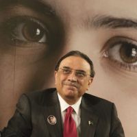Taxing endeavor: Pakistan President Asif Ali Zardari smiles during a ceremony at UNESCO headquarters in Paris on Monday to honor 15-year-old schoolgirl Malala Yousufzai, who was shot in the head by a Taliban gunman, in his country\'s northwest Swat Valley in October. | AP