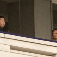 Fortunate son: The late North Korean leader Kim Jong Il (right) and his son Kim Jong Un watch a military parade commemorating the 65th anniversary of the founding of the Korean Workers\' Party in Pyongyang in October 2010. | BLOOMBERG