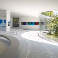 Museum curves: Paintings are dotted throughout a continuous, wide-open gallery space at the Hiroshi Senju Museum Karuizawa, which follows the contours of the slightly sloping site. | DAICI ANO, &#169; HIROSHI SENJU MUSEUM KARUIZAWA