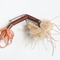 Yu-Chun Chen recycles plastic from shampoo bottles to create petals for her sakura brooches. | O-JEWEL