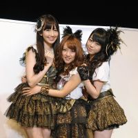 Caught in the middle: Minami Takahashi (center) poses with fellow members of the AKB48 spinoff group No Sleeves, Haruna Kojima (left) and Minami Minegishi (right). Takahashi\'s mother was recently fined for having sex with a 15-year-old boy. | BIFF