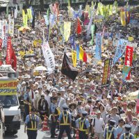 Count us in: As more and more people turn out for antinuclear rallies, inconsistencies in the estimated number of protesters have become a concern. At this event in Tokyo on July 16 the figure ranged from 75,000 to 170,000. | AP