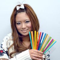 Hip young businesswoman Shiho Fujita  proudly shows off her collection of my-hashi chopsticks. | YOSHIAKI MIURA PHOTO