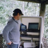 Don McCubbing checks his fish-counter data | C.W. NICOL PHOTO