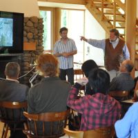 Water course: Canada-based rivers expert Don McCubbing gives a talk at our Afan Centre (above); a Coho salmon (above left) back to spawn in the Keogh River on Vancouver Island, where McCubbing sites obstructions (right) to create back eddies and pools. | SIMON WEARNE (ABOVE); DON MCCUBBING