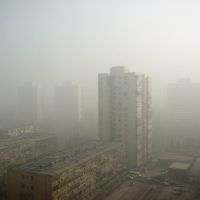 Danger zones: Residential tower blocks loom out of severely polluted air smothering the Wangjing district of Beijing on Jan. 14, 2013. Due in particular to China\'s heavy reliance on coal-fired power stations, killer smogs like this are regular features of life, and premature deaths, across large swaths of the country. | AFP-JIJI