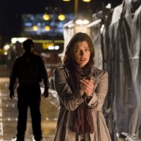 He\'s behiiiiind you: Anna (Milla Jovovich) is stalked by a creepy serial killer in \"Faces in the Crowd.\" | &#169; 2011 Faces Productions Inc., Faces Productions Manitoba Inc., Forecast Pictures S.A.S., Radar Films S.A.S.U.All rights reserved