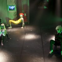 Stage direction: This year\'s Festival/Tokyo focuses on productions from Asia. A character from Li Jianjun\'s \"A Madman\'s Diary\" sits on a brick wall. | &#169; XIA MAOTIAN