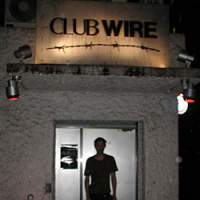 The outside of Shinjuku\'s Club Wire may look unassuming (top), but venture inside and you\'ll most likely be greeted by this smiling doorman (above) and &#8212; if you\'ve picked the right night of the week &#8212; the electro-rock sounds of DJ Duck Rock. | JUDE BRAND PHOTOS
