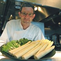No worries: Chef Olivier Rodriguez, of the Michelin-starred restaurant Signature at the Mandarin Oriental Hotel Tokyo, is one of many chefs around the world to voice confidence in Japanese produce, despite widespread contamination fears following 2011\'s nuclear disaster. He holds a tray of spring ingredients grown in western Japan. | MELINDA JOE