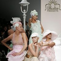 Models sporting unattractive frosted hairdos and sickly pastel-colored dresses pose en tableau vivant at the most recent Theatre Products show; Performance art unit Kathy and actor Mame Yamada star in one of the photographs on display at the \"Theatre Products no Genba\" exhibition on show at Parco Museum. | YOSHIAKI MIURA PHOTO