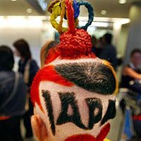 Non-Japanese students with naturally lighter or curlier hair are being singled out under Japanese school rules supposedly aimed at curbing unnatural or nonconformist hairdos. | AP PHOTO