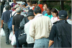 The faces behind the numbers: A day feeding Tokyo's hungry