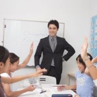 Second home: Principal Charles Knudsen teaches returnee students at Kikokushijo Academy. | COURTESY OF KIKOKUSHIJO ACADEMY