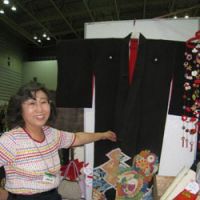 Elegance out of the attic: Katsuyo Kishi sells kimono at antique fairs for reduced prices, in the hope that more young people will wear them. | ERIKO ARITA PHOTO