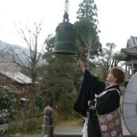 Priestly ways: Victoria Yoshimura, an ordained Buddhist priest, rings the bell at the begin of a funeral service at Shonenji Temple in Takachiho-cho, Miyazaki Prefecture. | COURTESY OF VICTORIA YOSHIMURA