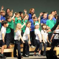 Glee club: The Tokyo International School choir sings at the beginning of a charity concert April 24. | SATOKO KAWASAKI SATOKO KAWASAKI PHOTO