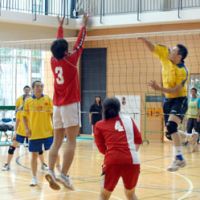 A player spikes the ball during the second World Amity Games Tournament held at Roppongi Junior High School in Minato Ward, Tokyo, on Aug. 1. | SATOKO KAWASAKI SATOKO KAWASAKI PHOTO