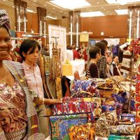 Something for everybody: Visitors to the 15th charity bazaar organized by Nihon Chukinto Africa Fujinkai on Oct. 27 check out the fare for sale. | KAZUAKI NAGATA PHOTOS