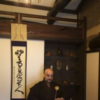 Randy Channell serves tea at his traditional Japanese tea and sweet shop, ran Hotei, in Kyoto. | COURTESY OF RANDY CHANNELL