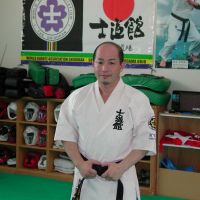 Get your kicks: Tetsuyoshi Kodama poses at his karate dojo in Hamamatsu, Shizuoka Prefecture. | MAMI MARUKO PHOTO